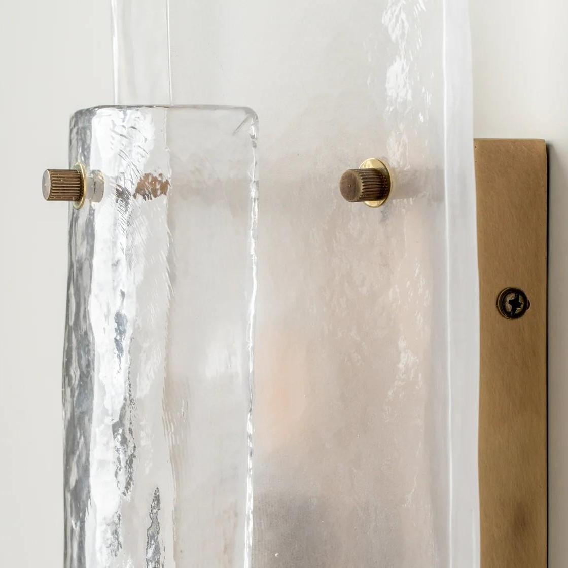 Zijaanzicht van de Velora glas- en metaalconstructie