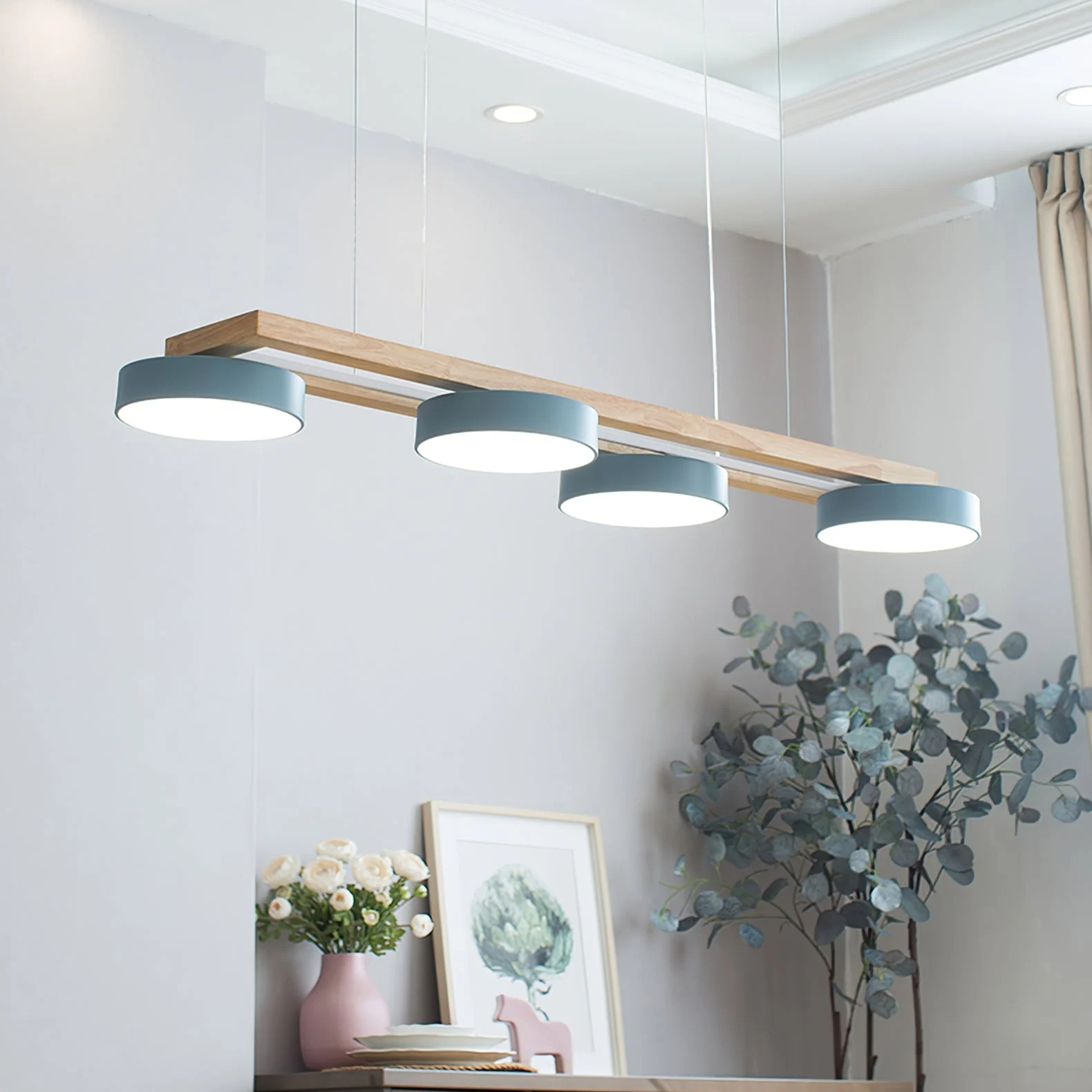 Sienna Bird kroonluchter boven eettafel