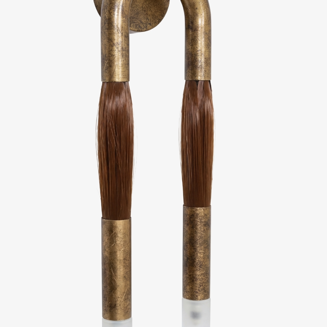Detail van de paardenhaarachtige afwerking van de Strandia wandlamp