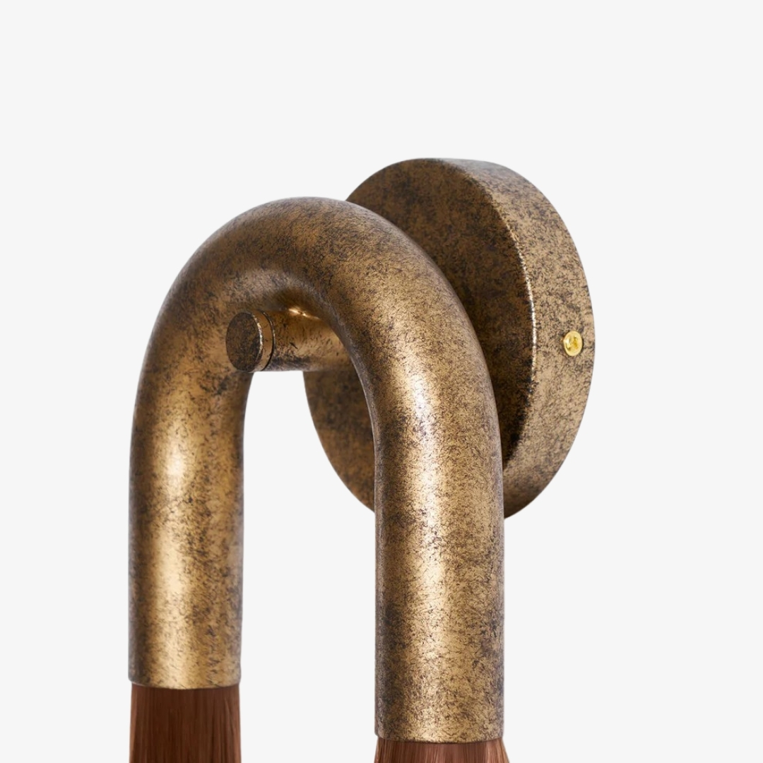 Detail van de oude gouden boog van de Strandia wandlamp