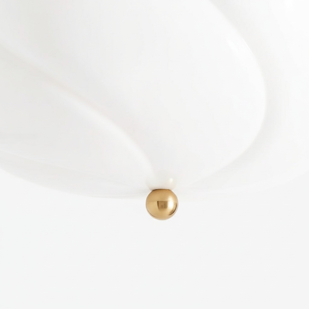 Detail van de glazen kap en messing knop