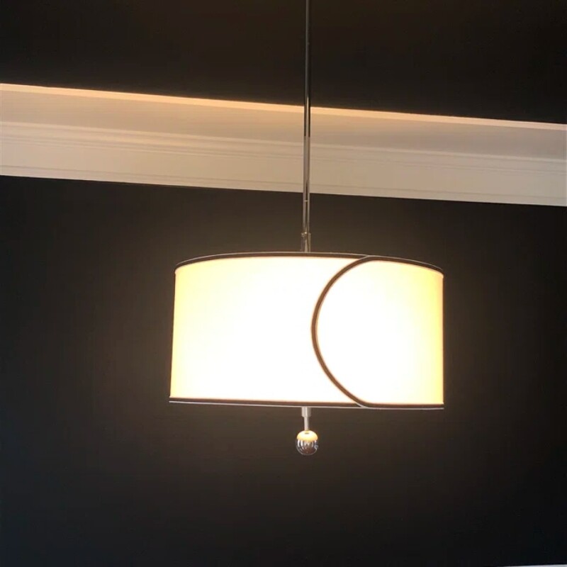 Klantfoto van de verlichte Roven Drum hanglamp
