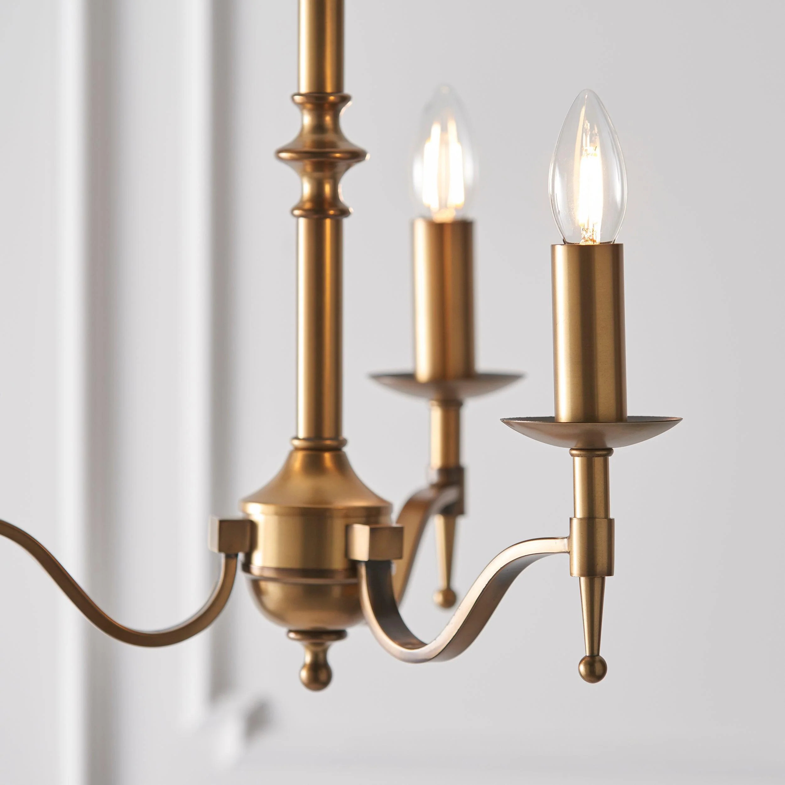 Close-up of Tela chandelier candle bulbs