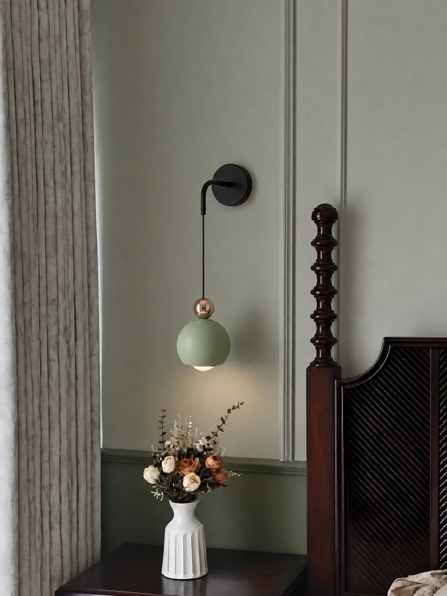 Wandinspiratie met zwarte bolvormige wandlamp
