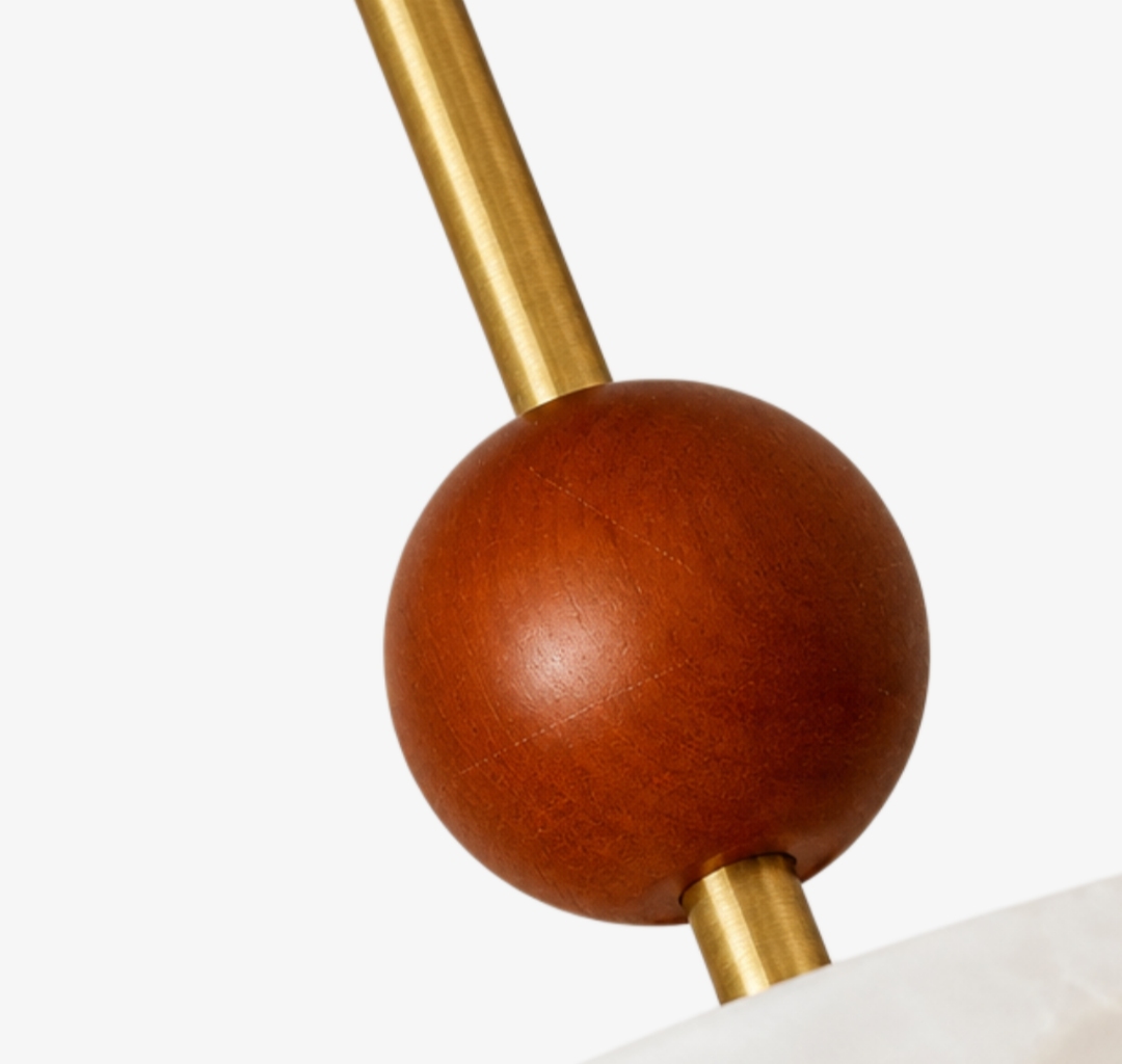 Close detail of the wooden accent and brass stem
