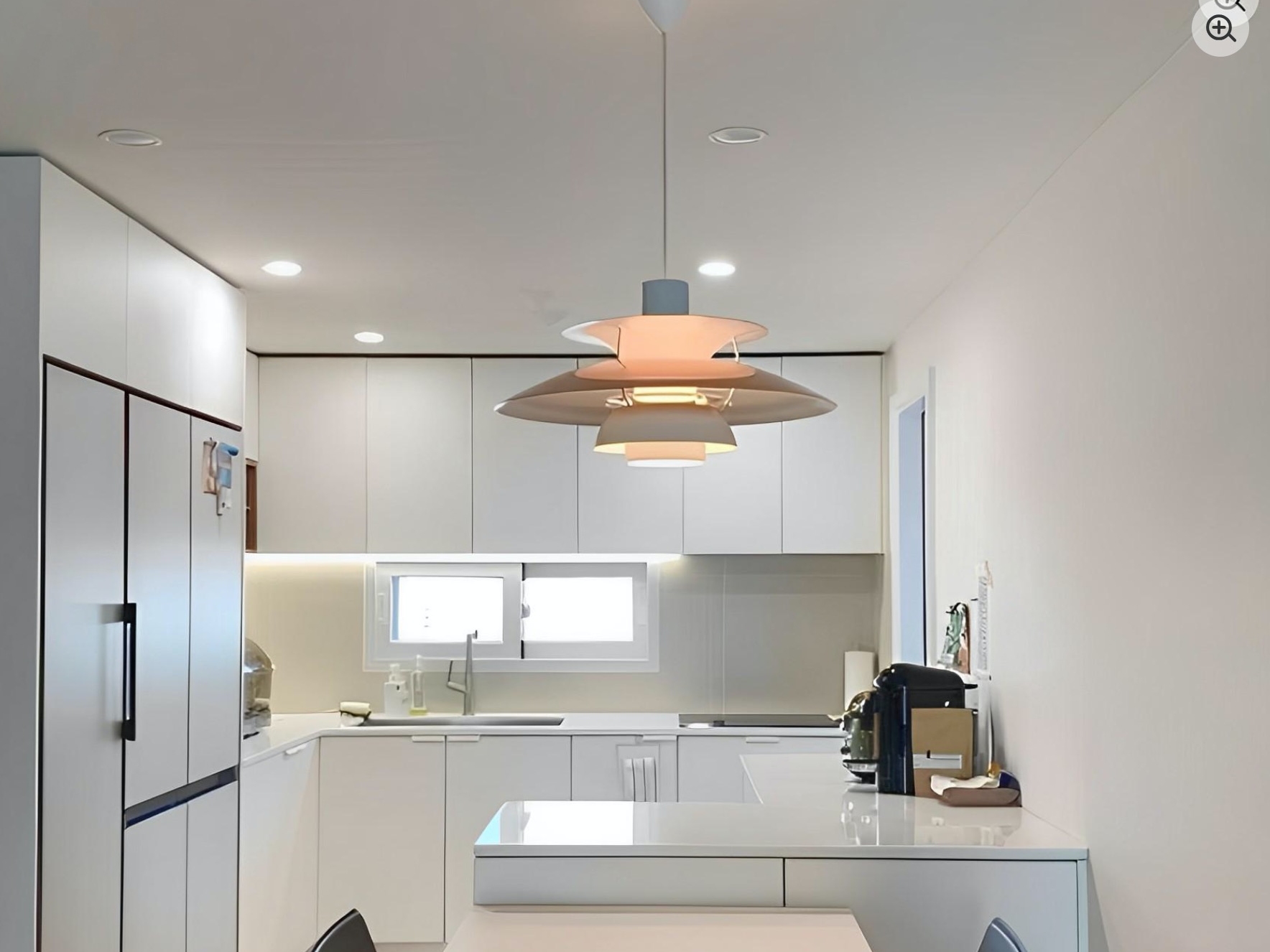 Klantfoto van de hanglamp in de keuken