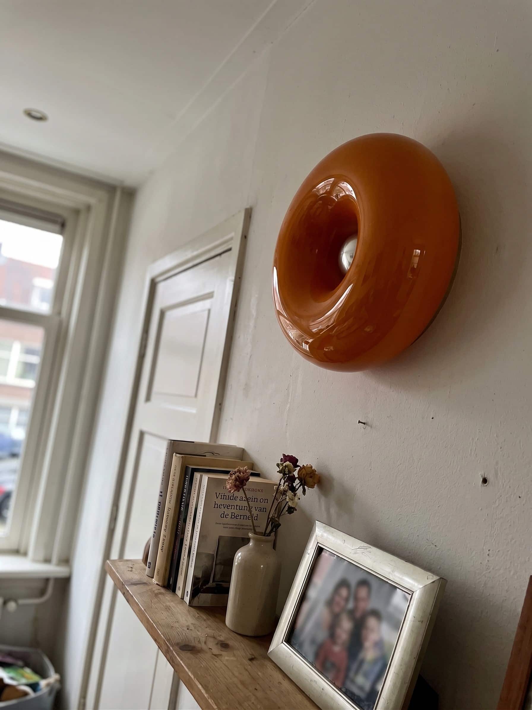 Fotorecensie van oranje Halorentis wandlamp