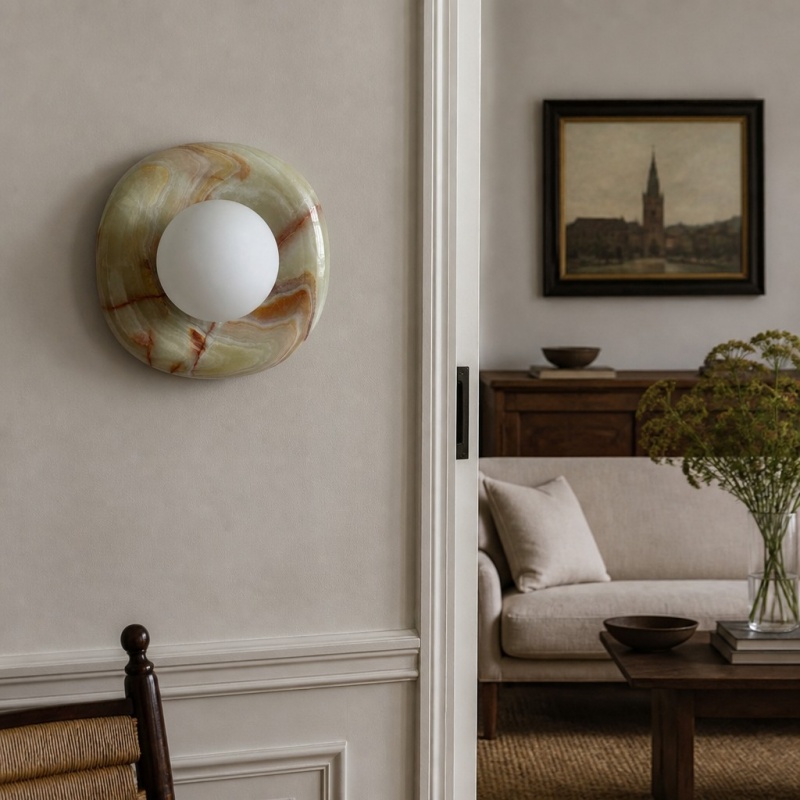 Oria wandlamp bij zitkamer