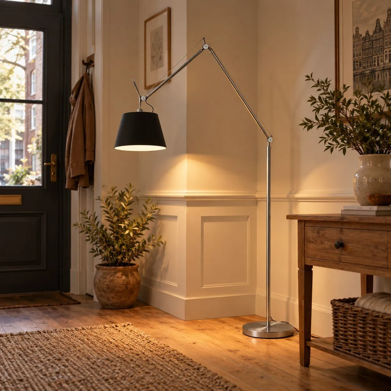 Silver and black floor lamp in a hallway